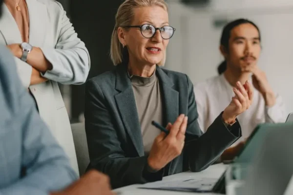 Real estate agents conversing during a meeting