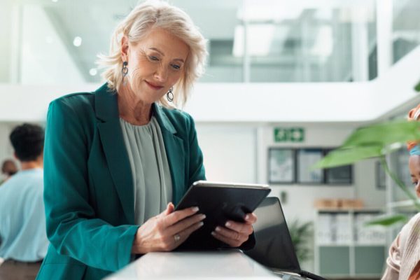 Business woman working on her tablet